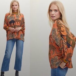 Anthropologie Orange Animal Print Blouse small hole back. Wouldn’t notice